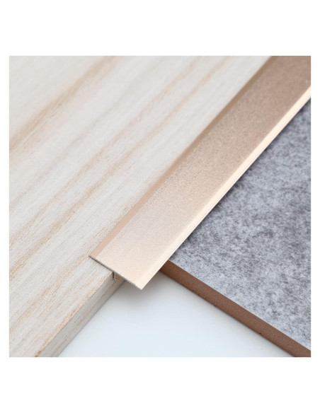 Tira de Moldura de Aluminio en T Trimold 0.9m Oro Mate Tira de Moldura de Aluminio en T Trimold 0.9m Oro Mate