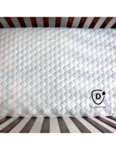 Protector de Cuna Impermeable Dry Defender Algodón Orgánico 71x132 cm Protector de Cuna Impermeable Dry Defender Algodón Orgánico 71x132 cm