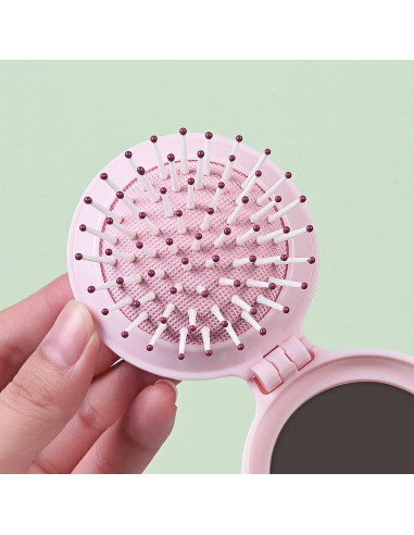 Mini Cepillo de Pelo Plegable con Espejo Trikeel Rosa 6.7cm