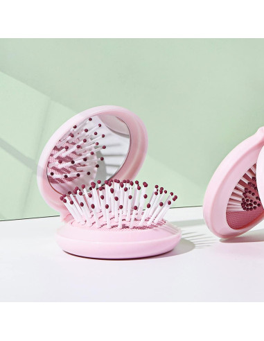 Mini Cepillo de Pelo Plegable con Espejo Trikeel Rosa 6.7cm